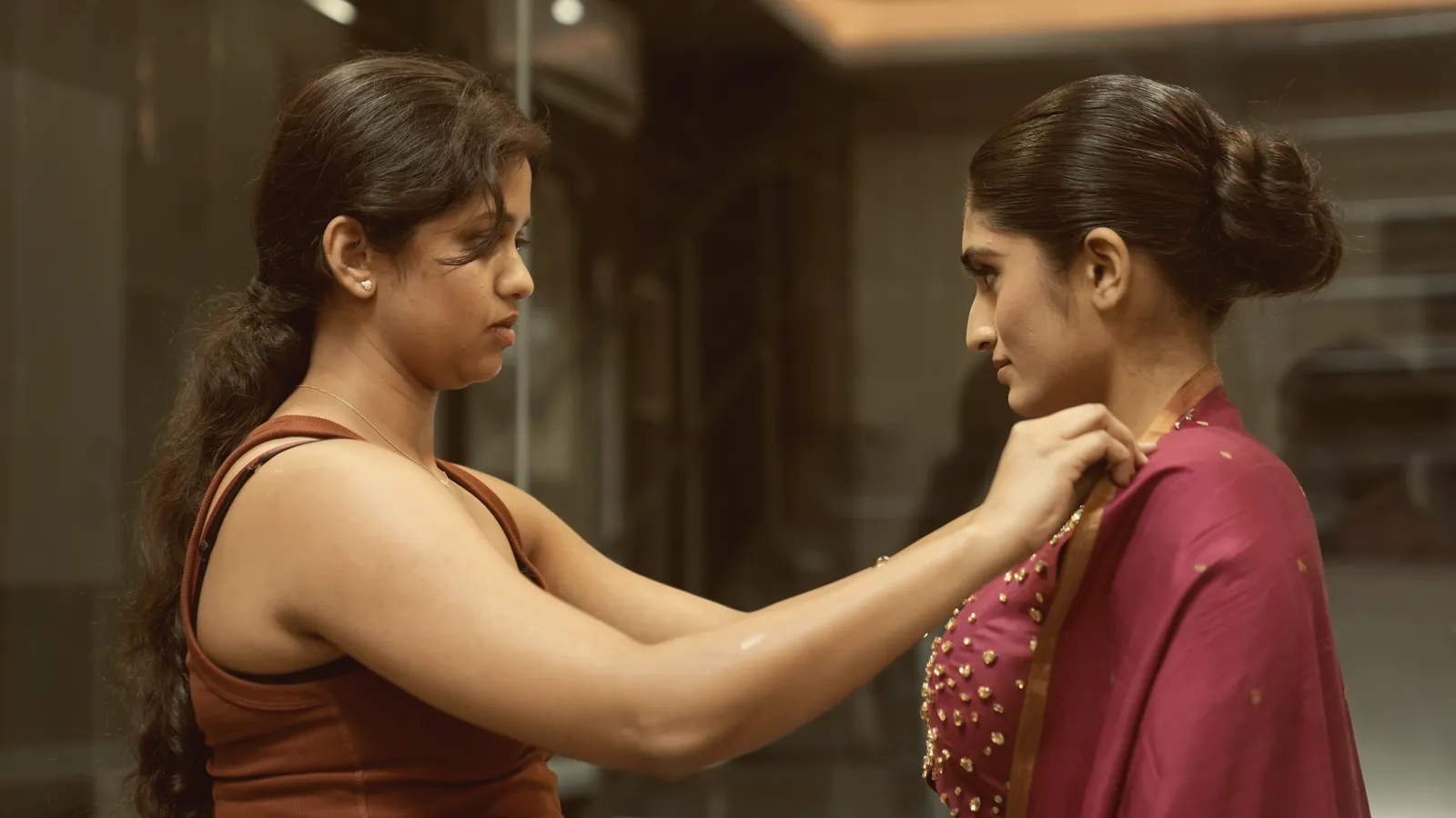 Ananya styling a model on set